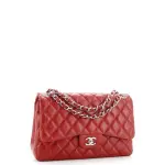 Chanel Jumbo Red Caviar Leather Double Flap Silver Hardware Bag.