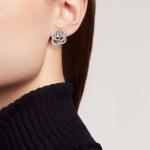 CHANEL FIL DE CAMELIA earrings featuring a hollowed-out camellia design, made of 18K white gold set with diamonds