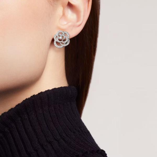 CHANEL FIL DE CAMELIA earrings featuring a hollowed-out camellia design, made of 18K white gold set with diamonds